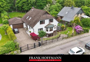 Attraktives Einfamilienhaus mit großzügiger Wohnfläche in begehrter Waldrandlage in Quickborn