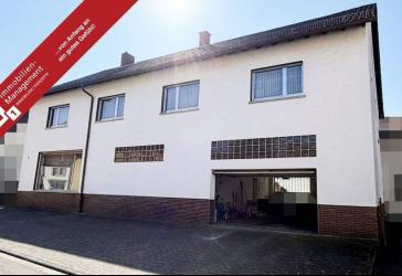 Großzügiges Ein- bis Zweifamilienhaus mit Garten, XXL-Garage und Ausbaureserve