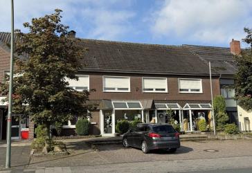 WuG-Haus mit etabliertem Friseursalon und bezugsfreier Wohneinheit zentral in Vorhelm!