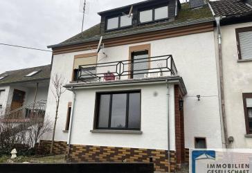 Vermietetes Reihenmittelhaus mit kleinem Nebengebäude in Hümmerich!
