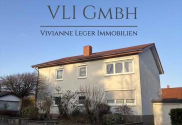 Zweifamilienhaus in St. Ingbert-Hassel - gepflegtes Wohnhaus mit großem Garten und flexibler Nutzung