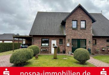 Vermietete Doppelhaushälfte mit Carport