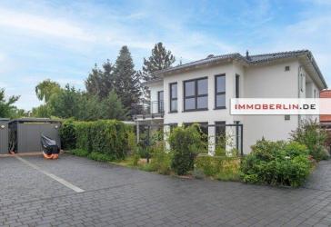 IMMOBERLIN.DE - Modernes Ein-/Zweifamilienhaus mit Südterrasse & -balkon in Harmonielage