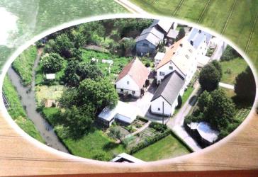 219 m² Wohnfläche + Hof + Werkstatt + 1.780 m² Grundstück