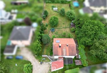 Einfamilienhaus auf 1.009 m² Grundstück mit traumhaftem Garten und Entwicklungspotenzial