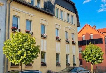 TOP 2-Raum Wohnung Balkon, Tageslichtbad, Carport, Gartennutzg.