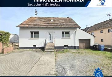 IK | Spesbach: Gemütliches, gepflegtes Haus mit Garage in guter Lage