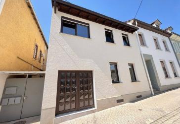 Familienfreundliches Einfamilienhaus mit Dachterrasse und viel Wohnqualität