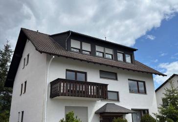 Wohnung im EG mit Terrasse und eigenem Garten