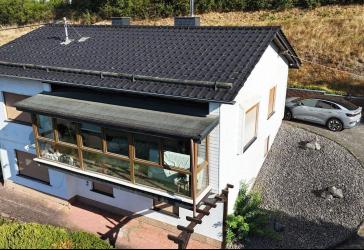 Einfamilienwohnhaus in toller Aussichtslage mit einem Gesamtgrundstück von rd. 2.888 m²