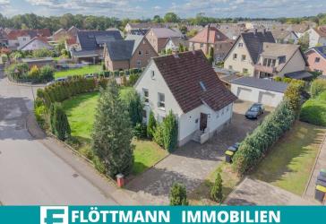 Einfamilienhaus mit Doppelgarage, großem Garten und Gestaltungsspielraum in Bielefeld-Ummeln!