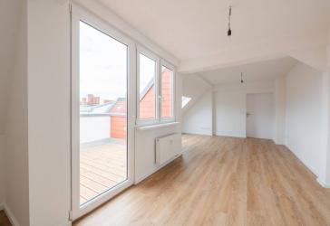 Erstbezug: Lichtdurchflutete Dachgeschoss-Wohnung mit Terrasse, moderner Ausstattung und in Top-Lage