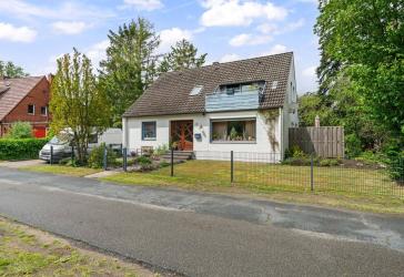 Martfeld | Charmantes Zuhause mit viel Platz, Gartenidylle & flexiblen Wohnideen in bester Ortslage.