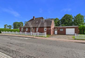 Sanierungsbedürftiges Einfamilienhaus mit herrlichem Garten und Platz für Neues