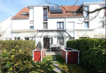 Wo Kinderlachen zu Hause ist: Reihenhaus mit vier Schlafzimmern und Garten an Anliegerstraße