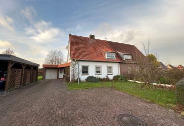 Ihr neues Zuhause in Otterndorf: Doppelhaushälfte mit Garten, Garage und zusätzlichem Raumangebot