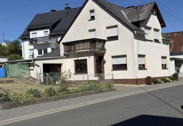 Gepflegtes Einfamilienwohnhaus mit Anbau (Hobbyraum und PKW-Garage) in Langenfeld
