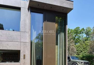 UNIQUE I Monolithische Villa mit Tiefgarage und Einliegerwohnung