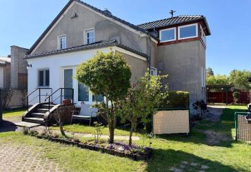 Zuhause mit Geschichte & Perspektive: Einfamilienhaus mit Einliegerwohnung auf großem Grundstück