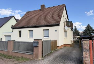 Preisreduzierung - Großzügiges Familienhaus mit Gartenidylle, Terrasse, Balkon und Garage