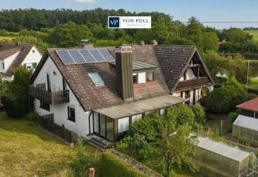 Traumhaftes Zweifamilienhaus in malerischer Landschaft mit sonnigem Grundstück!