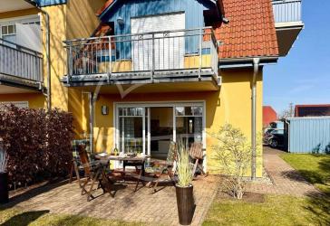 Helle Erdgeschosswohnung mit 2 Schlafzimmern, sonniger Terrasse und eigenem Garten.