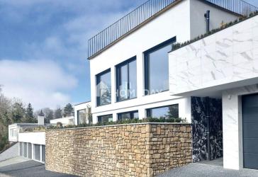 Stilvolle Maisonettewohnung mit großzügiger Dachterrasse und beeindruckender Architektur