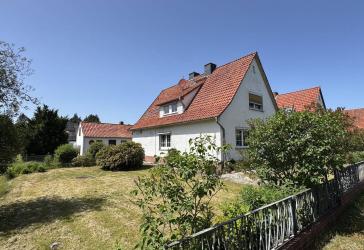 Charmantes Einfamilienhaus mit Einliegerwohnung und teilbarem Grundstück