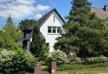 Einfamilienhaus mit außergewöhnlichem Entwicklungspotenzial in begehrter Wohnlage