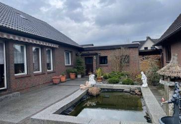 Gepflegtes Einfamilienhaus mit 123 qm Wohnfläche, ausgebautem Dachgeschoss, Wintergarten und Doppelgarage auf 487 qm Grundstück in Neu Wulmstorf