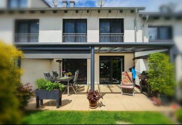 Zeitlose Eleganz trifft modernen Wohnkomfort - hochwertiges Reihenhaus mit exklusivem Interior