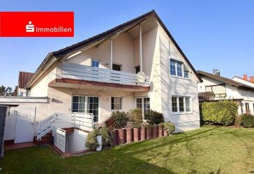 Gepflegtes 2-Familienhaus mit schönem Garten und Garage in gesuchter Wohnlage!