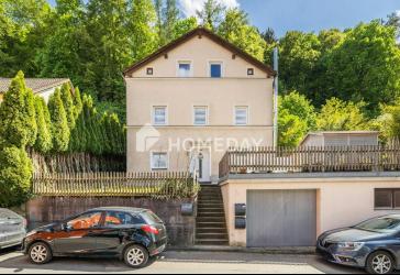 Kapitalanlage oder Familiendomizil? Vielseitiges Mehrfamilienhaus mit 3 WE und Geschichte
