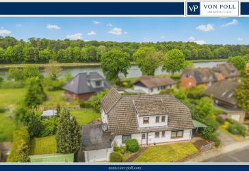 Wohnen mit Schiffsverkehr: Charmantes Einfamilienhaus mit Einliegerwohnung am Nord-Ostsee-Kanal