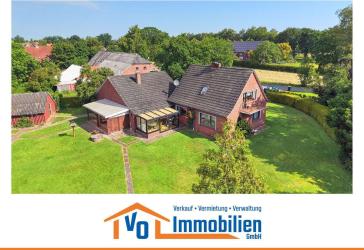 Einfamilienhaus mit Doppelgarage und Wintergarten auf weitläufigem Grundstück in Strackholt