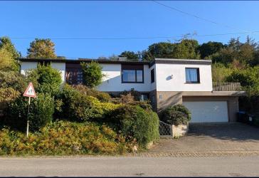 Ein Zuhause in beliebter Wohnlage - mit Südterrasse, Garten und Weitblick