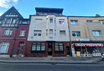 Provisionsfrei: Mehrfamilienhaus-Investment mit 8 WE, Gewerbe und Garagen