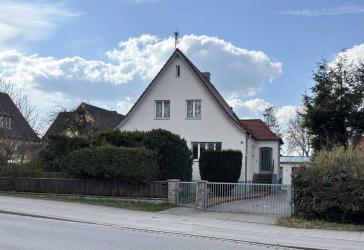 Bezauberndes Siedlungshaus mit einer Symbiose aus 50er Jahre Charme und Moderne