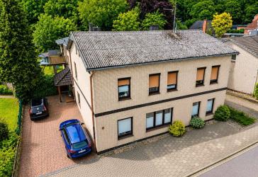 MFH mit erheblichen Mietsteigerungsreserven | 4 Wohneinheiten | 5 Garagen