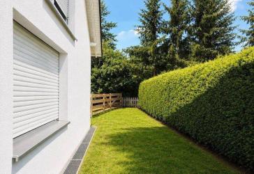 Großzügige 4-Zimmer-Maisonette Wohnung mit Hauscharakter, Garten und 2 Garagen