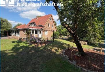 Exklusiver Resthof in idyllischer Kanallage - viel Platz und Natur