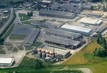 7,6 ha großes Gewerbegrundstück - bebaut mit Lagerhallen und Umschlageinrichtungen - zu verkaufen!