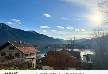 Ferienimmobilie im Miteigentum: Gartenwohnung mit See- und Bergblick