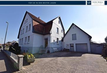 1-2 Familienhaus mit Baugrundstück in zentraler Lage