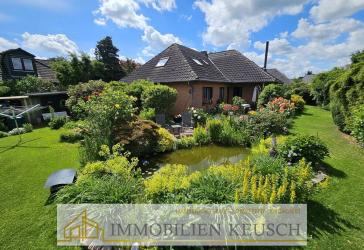 Sehr geflegte, große und ruhig gelegene Immobilie über 2 Etagen mit Traumgarten und Teich + Garage