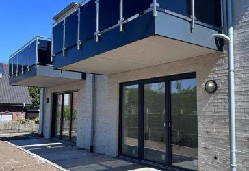 Moderne Neubauwohnung mit Terrasse und eigenem Garten - barrierefrei & energieeffizient