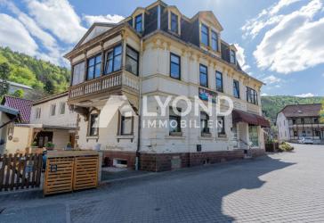 Vielseitiges Mehrfamilienhaus mit Gewerbefläche - Historischer Charme trifft moderne Ausstattung