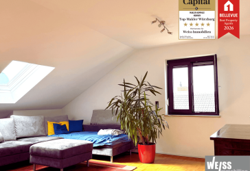 Attraktive 3-Zimmer-Dachgeschosswohnung mit Einbauküche und Gemeinschaftsgarten