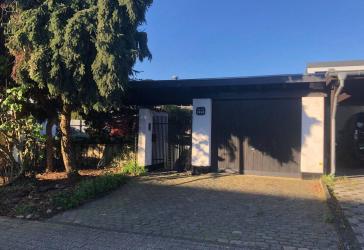 Exklusive Wohlfühloase - Außergewöhnliches Einfamilienhaus mit parkähnlichem Garten