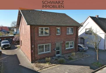 Charmantes Zweifamilienhaus mit Potenzial: Großzügiges Wohnen mit Mieteinnahmen in Liesborn